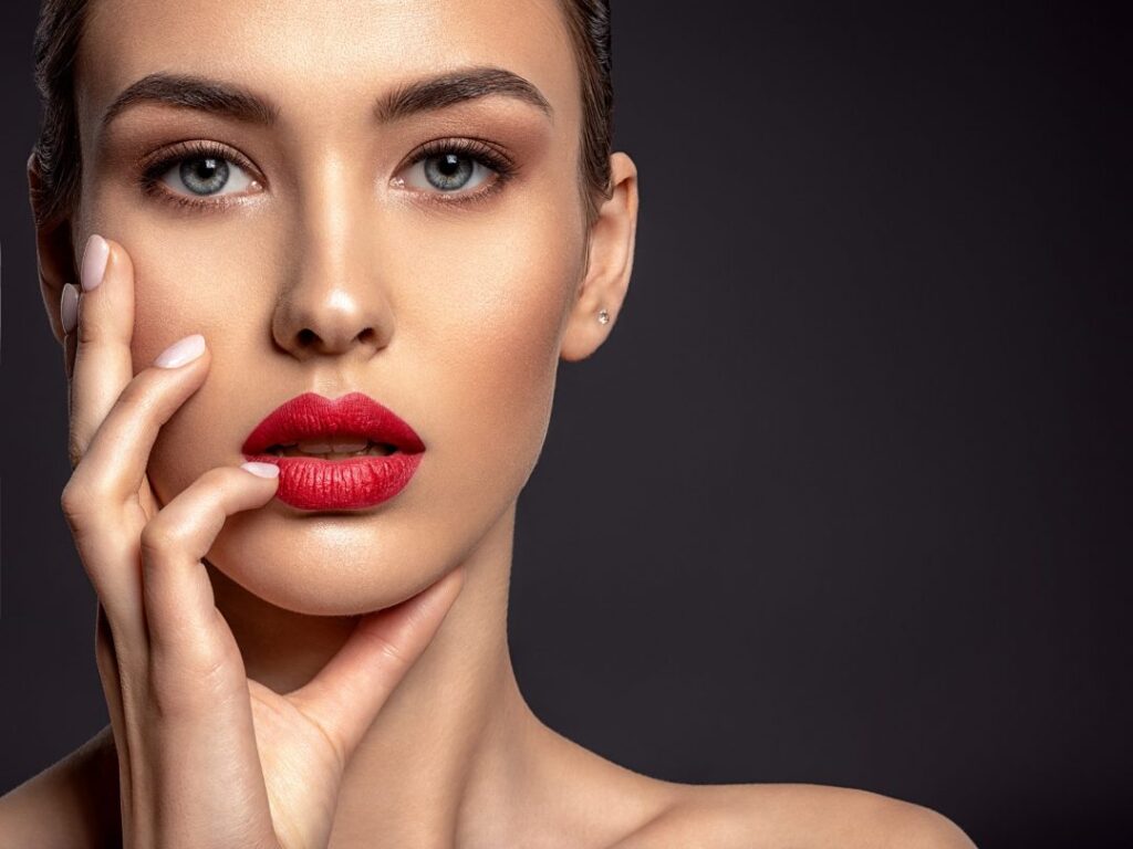 beautiful woman with bright make up and red lips